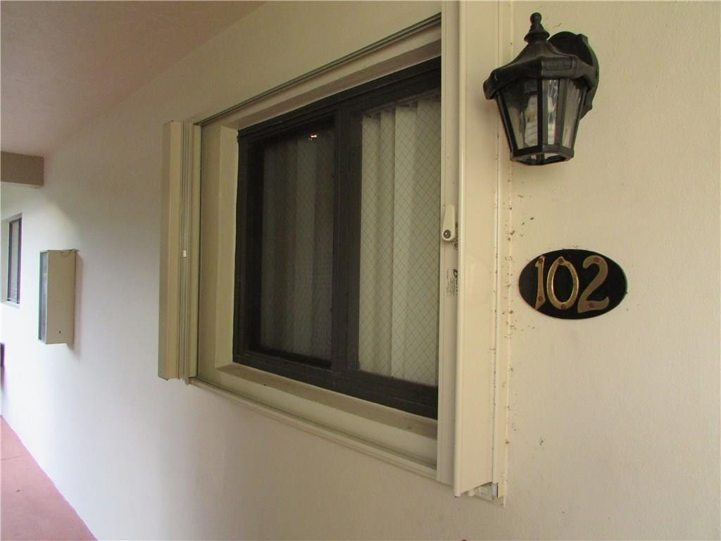 140 Northwest 70th Street, Unit 102 Boca Raton, FL 33487 - Photo 16 of 16 Accordion Shutters!