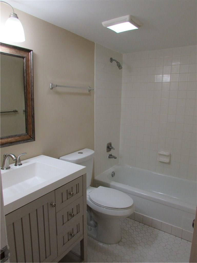 140 Northwest 70th Street, Unit 102 Boca Raton, FL 33487 - Photo 10 of 16 Guest Bathroom