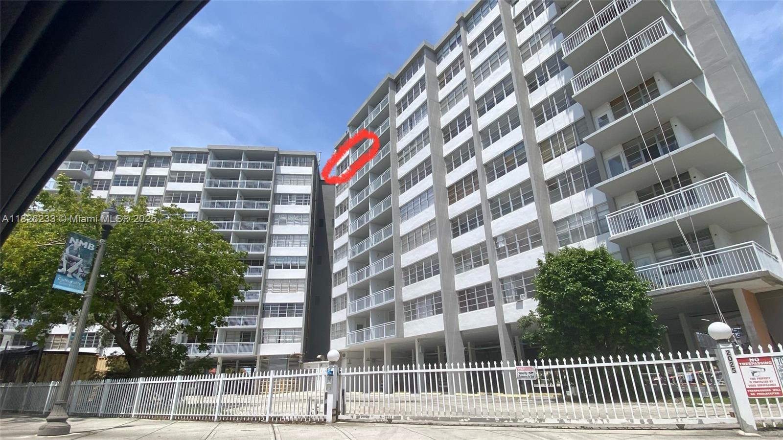 2025 Northeast 164th Street, Unit 901 North Miami Beach, FL 33162 - Photo 11 of 12 a view of a building