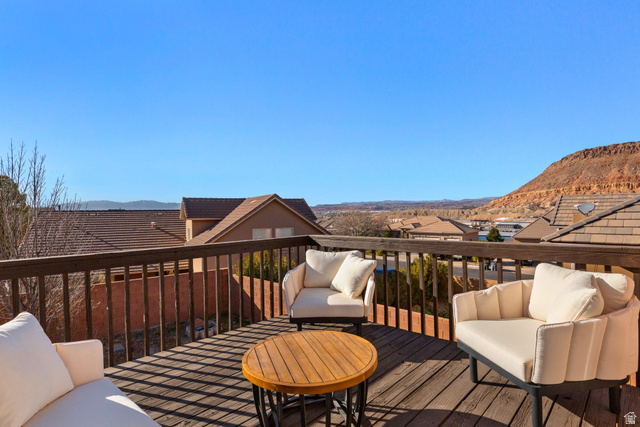 1570 South Rio Virgin Drive Washington, UT 84780 - Photo 54 of 71 Deck featuring a mountain view and an outdoor lounge area