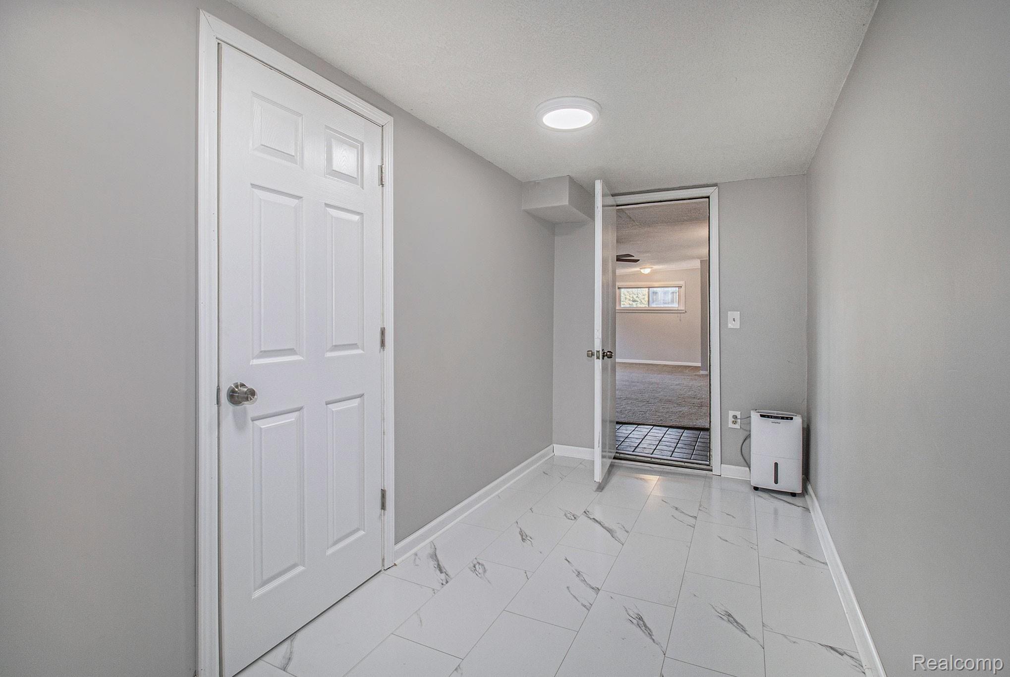 5891 Zimmer Road Williamston, MI 48895 - Photo 25 of 32 Main Floor Mudroom off Garage