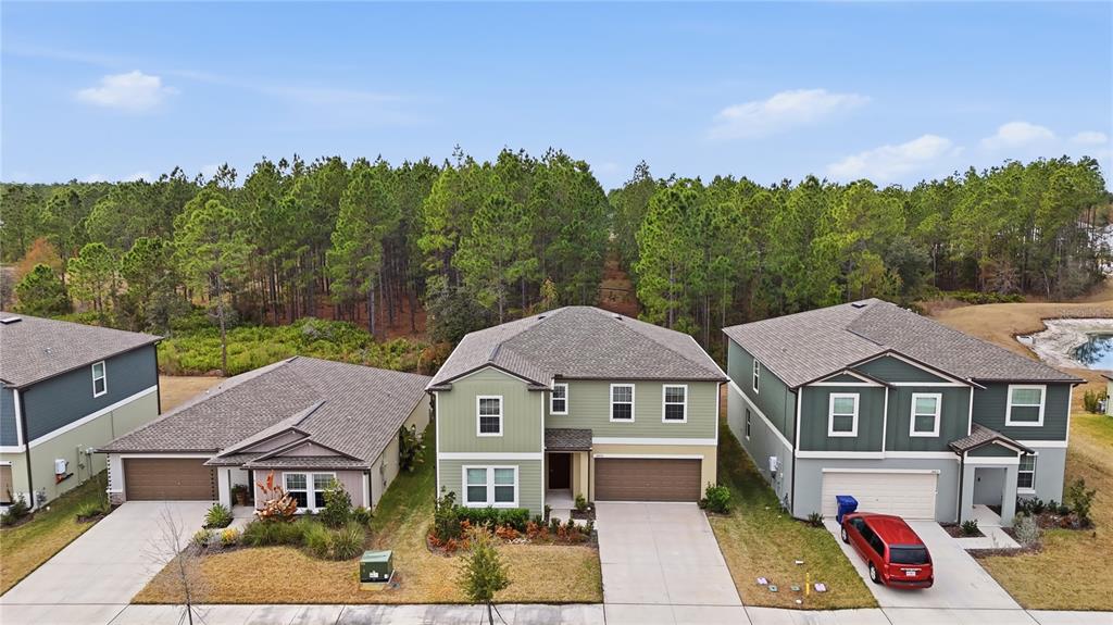 2455 Lanier Road Zephyrhills, FL 33541 - Photo 35 of 39 an aerial view of a house