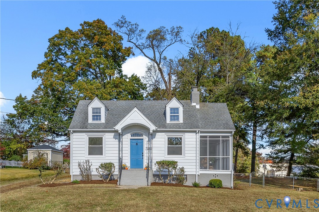 7232 Edgeworth Road Mechanicsville, VA 23111 - Photo 1 of 31 New england style home featuring a sunroom, a chim