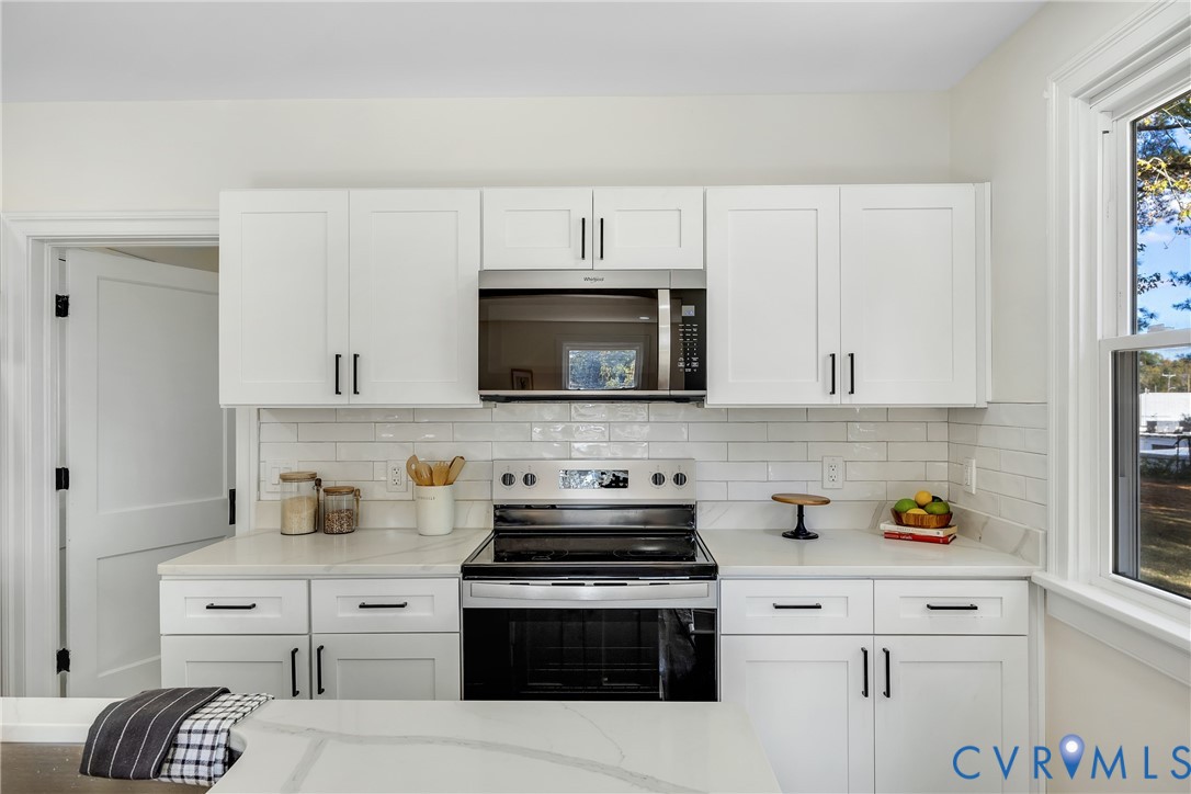7232 Edgeworth Road Mechanicsville, VA 23111 - Photo 11 of 31 Kitchen featuring stainless steel appliances, whit