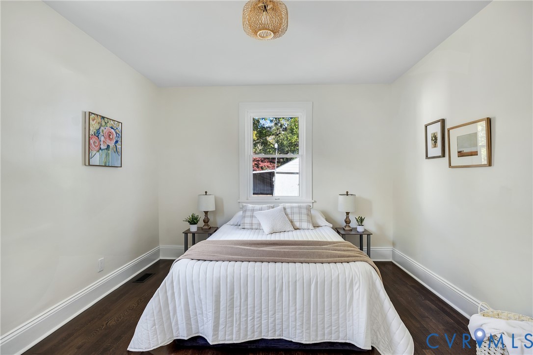 7232 Edgeworth Road Mechanicsville, VA 23111 - Photo 13 of 31 Bedroom featuring dark wood finished floors