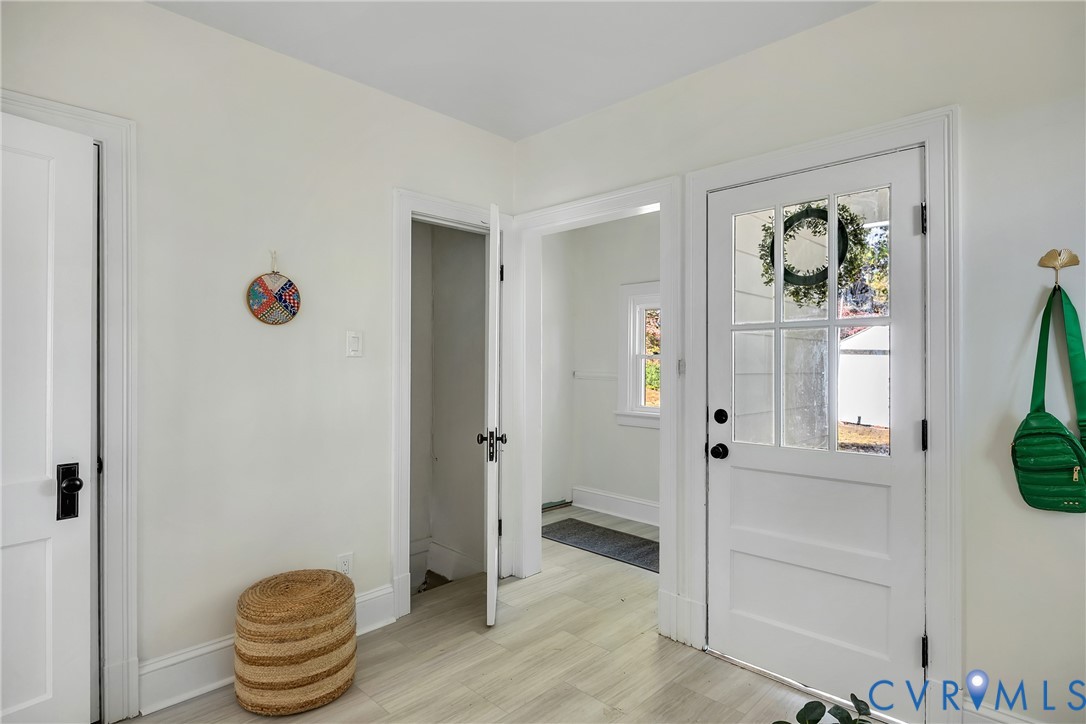 7232 Edgeworth Road Mechanicsville, VA 23111 - Photo 22 of 31 Entryway featuring baseboards and light wood-style
