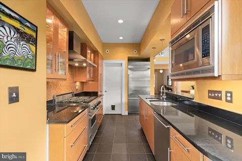 a view of a hallway with entryway