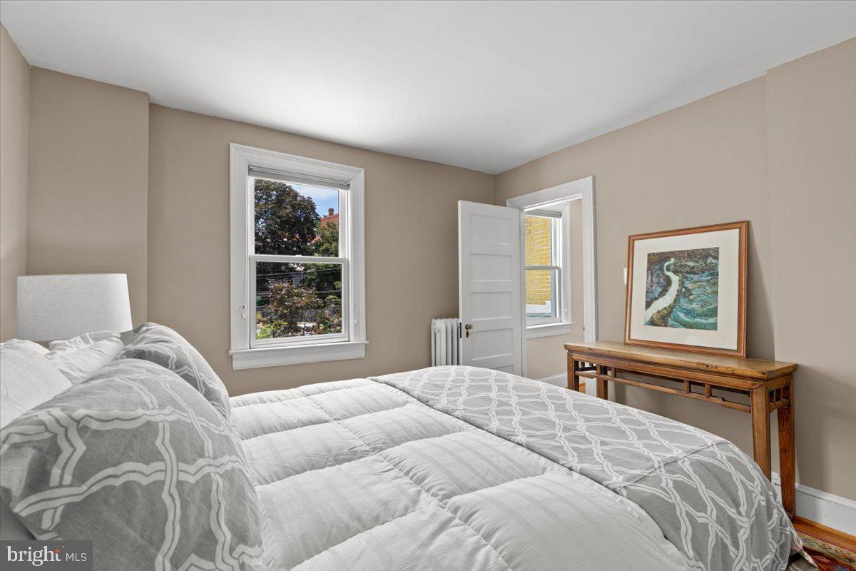 2816 27th Street Northwest Washington, DC 20008 - Photo 41 of 71 a bedroom with a bed and a window