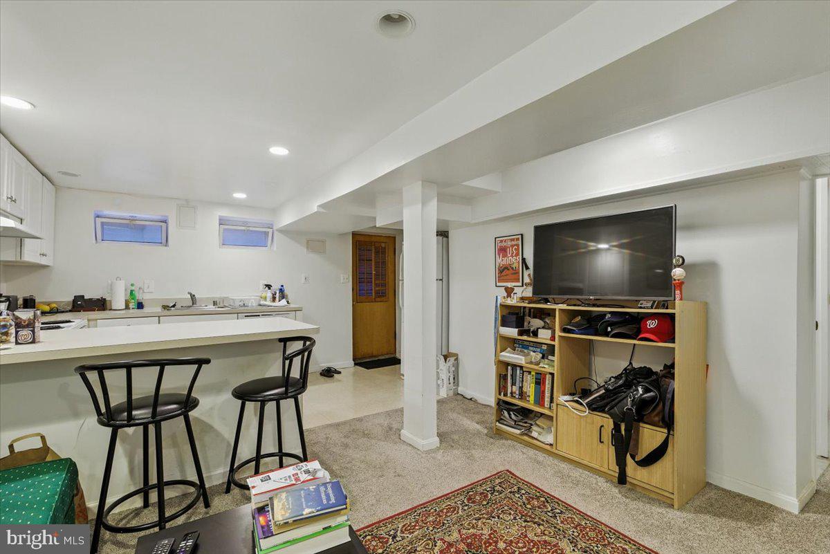 2816 27th Street Northwest Washington, DC 20008 - Photo 61 of 71 a view of a livingroom with furniture and a flat screen tv