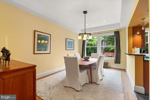 a kitchen with stainless steel appliances granite countertop a stove and a refrigerator