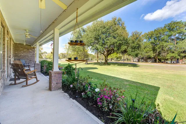 a view of a swimming pool with a patio
