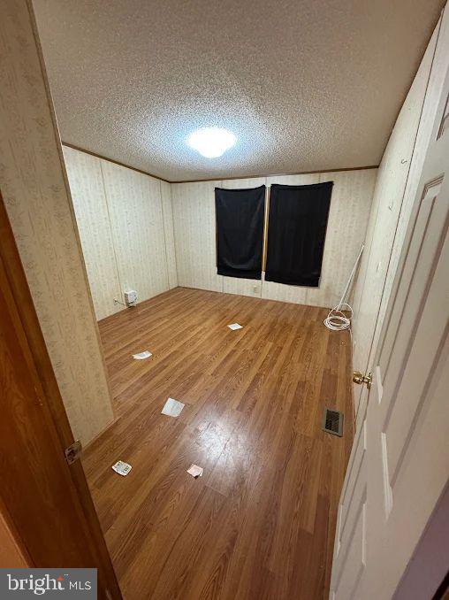 118 Beth Place Dover, DE 19901 - Photo 12 of 13 a view of an empty room with wooden floor