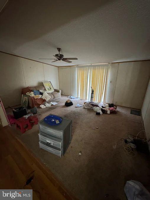 118 Beth Place Dover, DE 19901 - Photo 4 of 13 a bed room with a bed a window and a couch