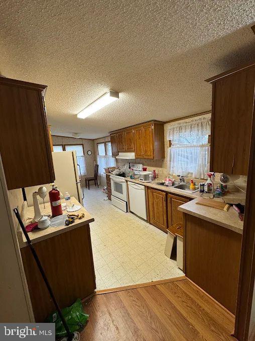 118 Beth Place Dover, DE 19901 - Photo 6 of 13 a kitchen with kitchen island granite countertop a sink counter top space and appliances