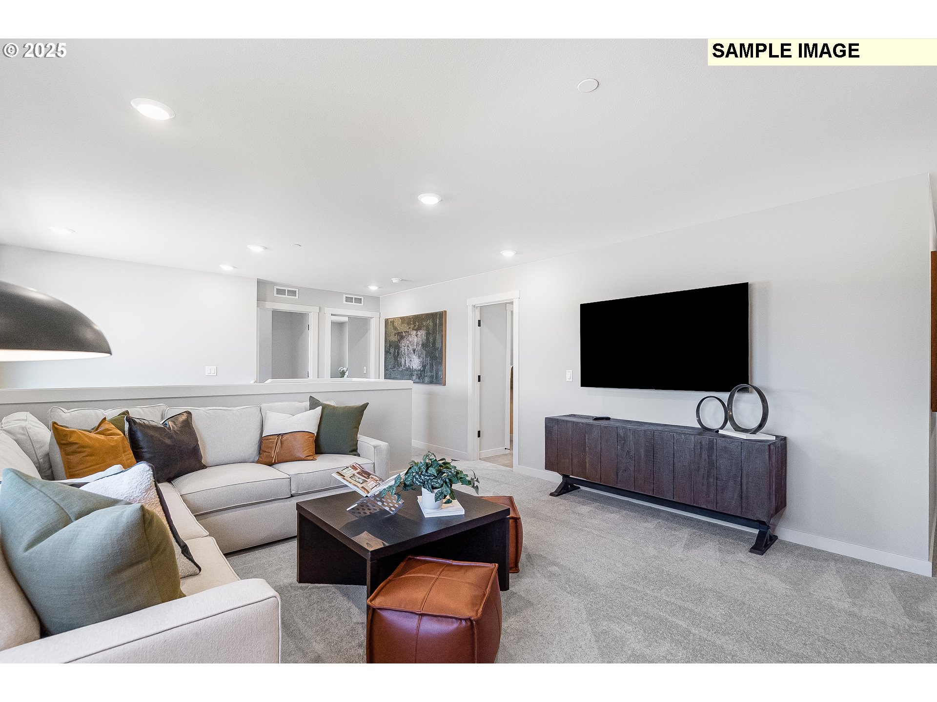 2650 South 4th Way Ridgefield, WA 98642 - Photo 17 of 43 a living room with furniture and a flat screen tv