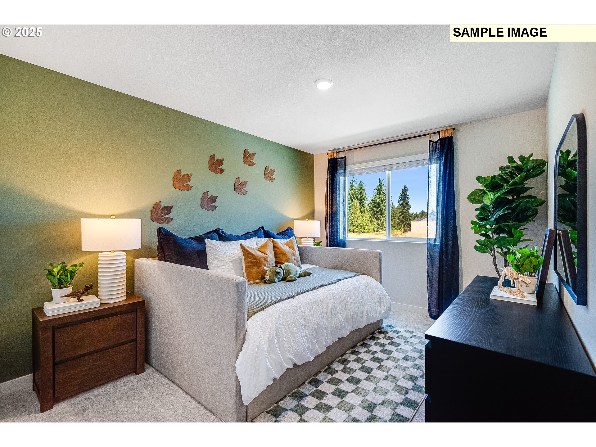 2650 South 4th Way Ridgefield, WA 98642 - Photo 22 of 43 a bedroom with a bed and a potted plant