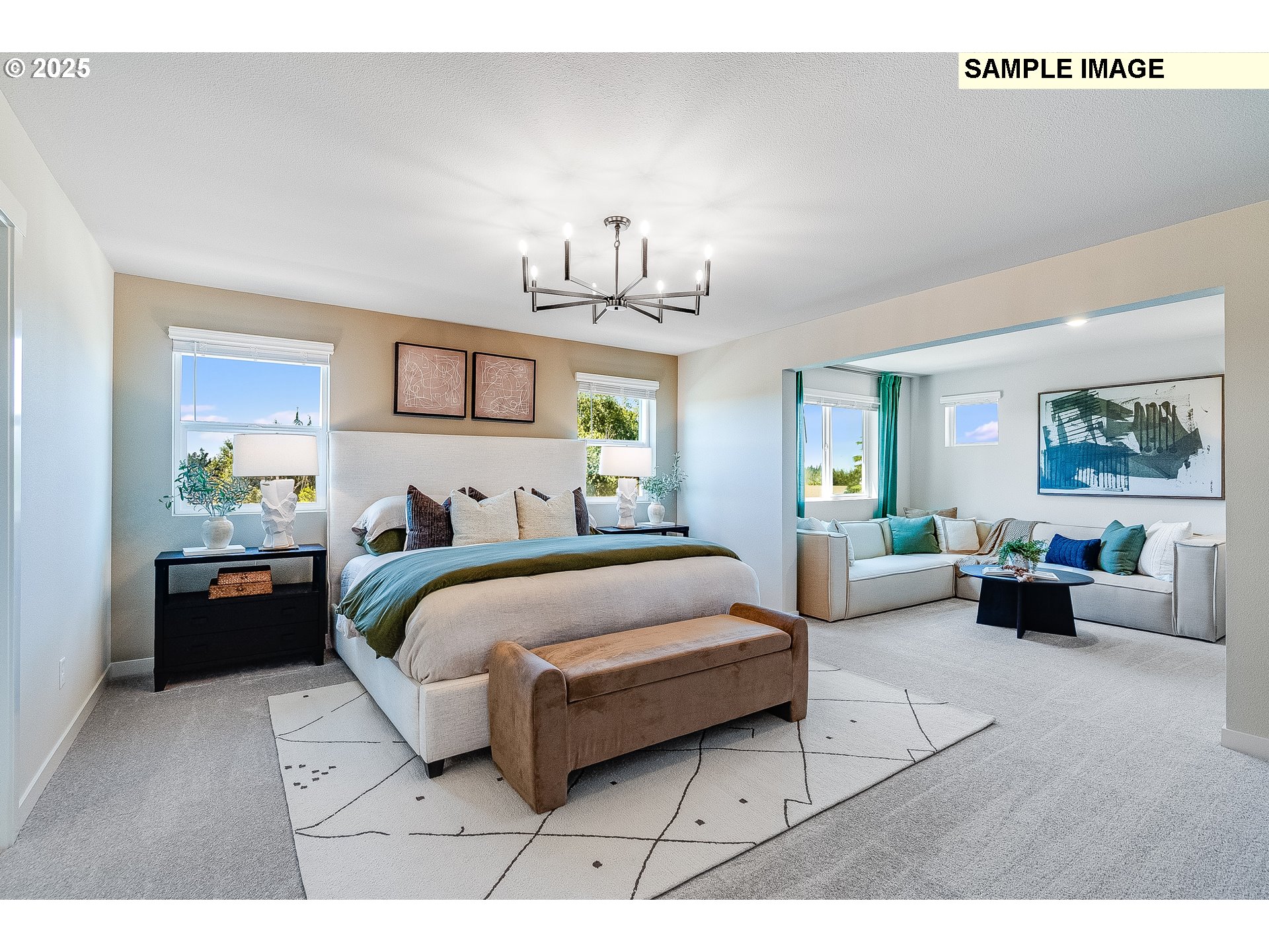 2650 South 4th Way Ridgefield, WA 98642 - Photo 26 of 43 a spacious bedroom with a bed a couch and a window