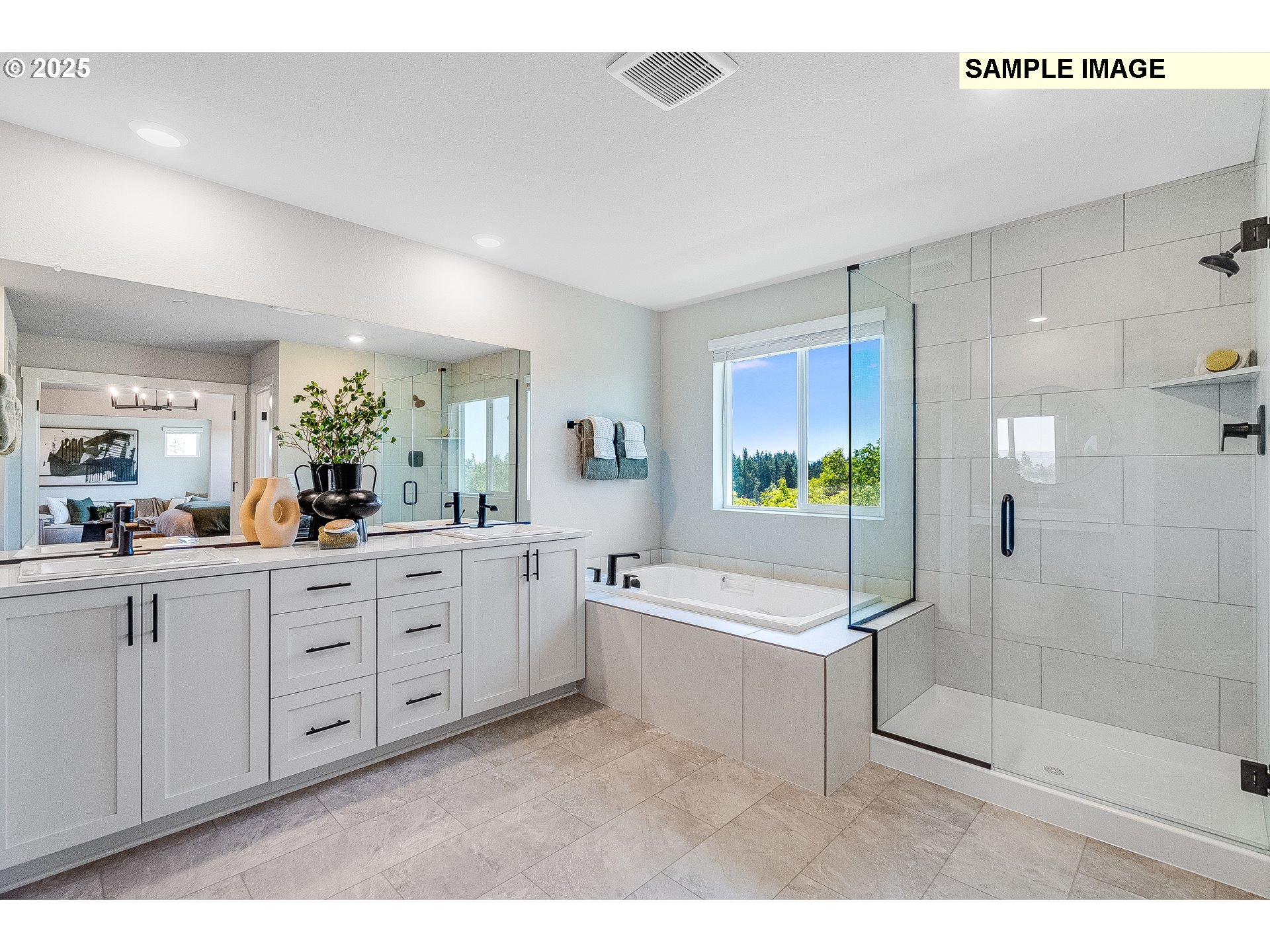 2650 South 4th Way Ridgefield, WA 98642 - Photo 27 of 43 a spacious bathroom with a double vanity sink a mirror and a bathtub