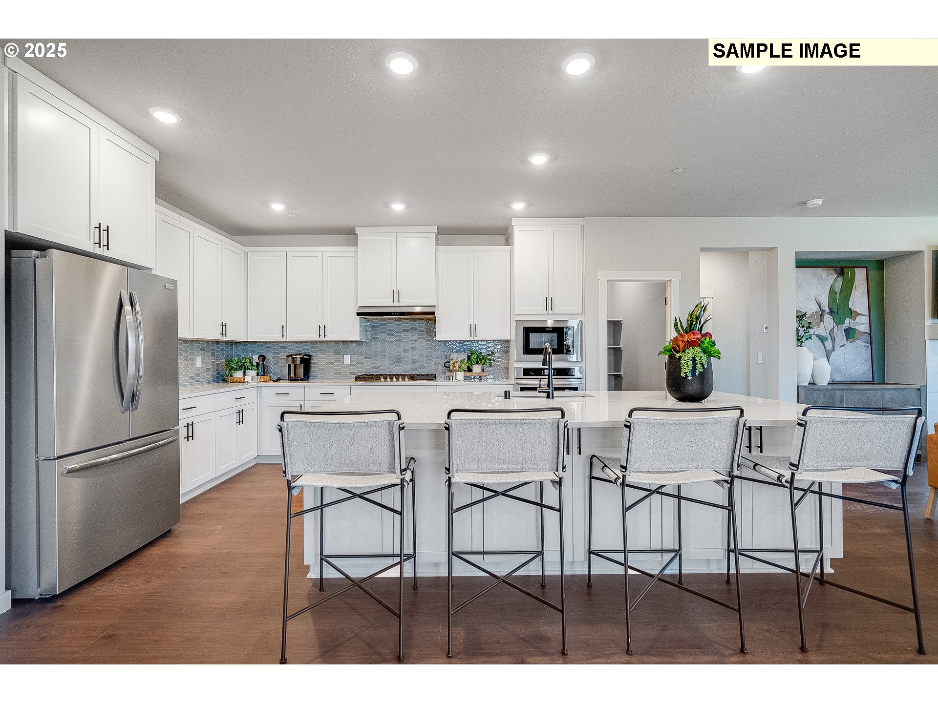 2650 South 4th Way Ridgefield, WA 98642 - Photo 8 of 43 a view of kitchen with dining table and chairs