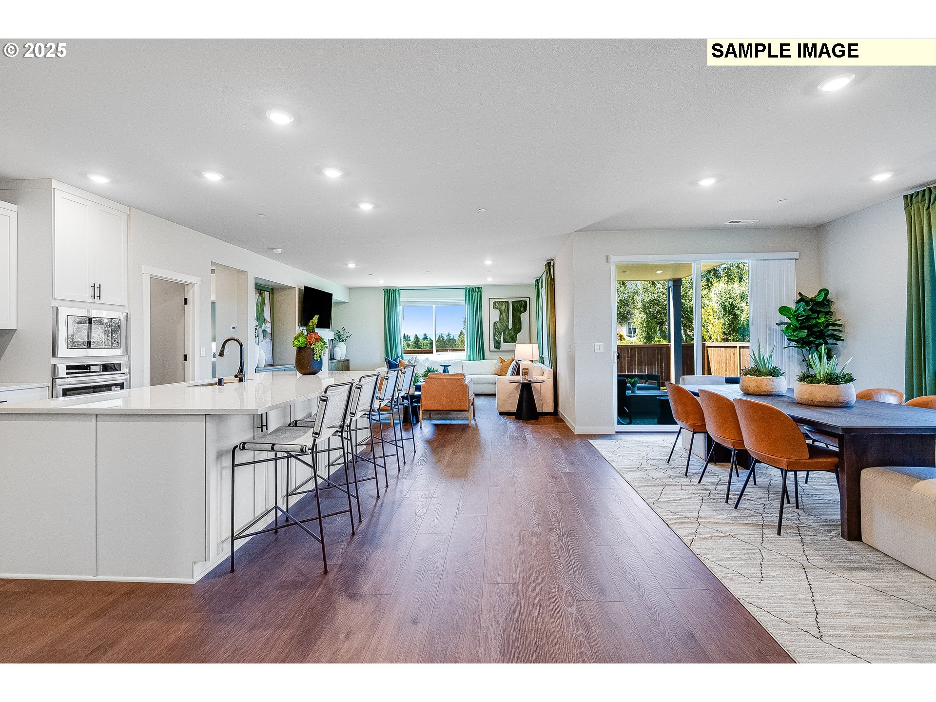 2650 South 4th Way Ridgefield, WA 98642 - Photo 9 of 43 a living room with furniture and a wooden floor