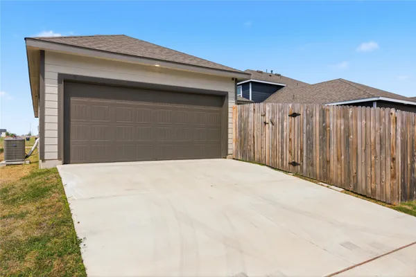 a front view of a house with a garage