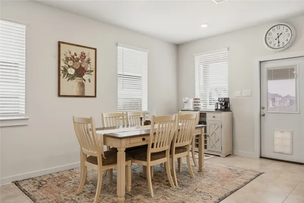 a living room with dining room