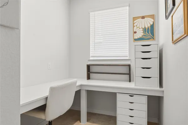 a bathroom with a double vanity sink mirror and shower