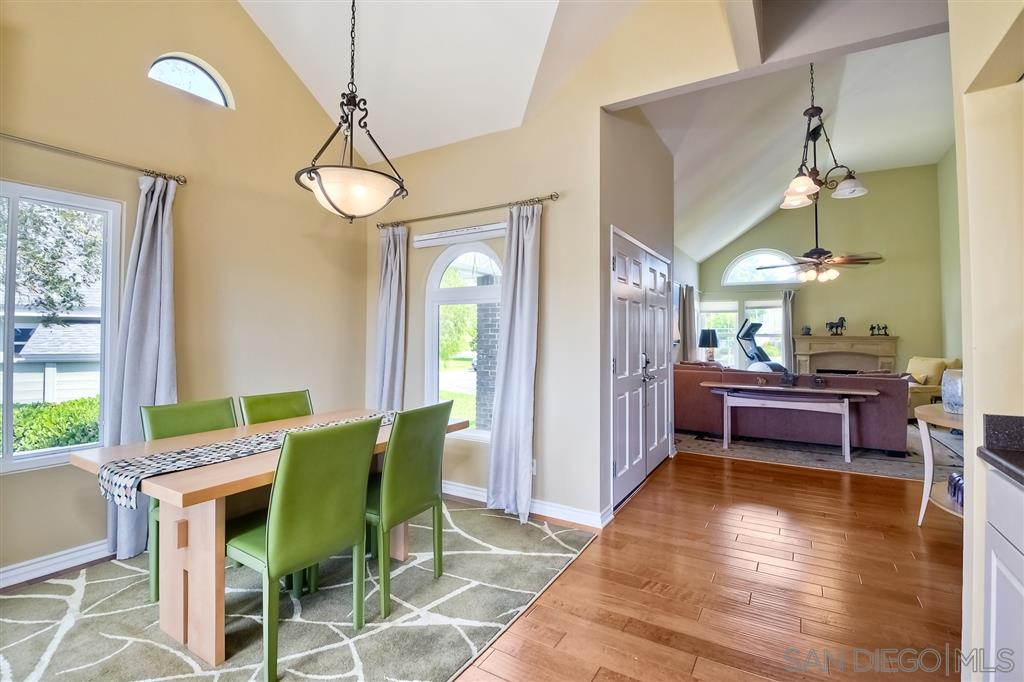 3622 Garner Place Encinitas, CA 92024 - Photo 11 of 25 a view of a dining room with furniture window and wooden floor