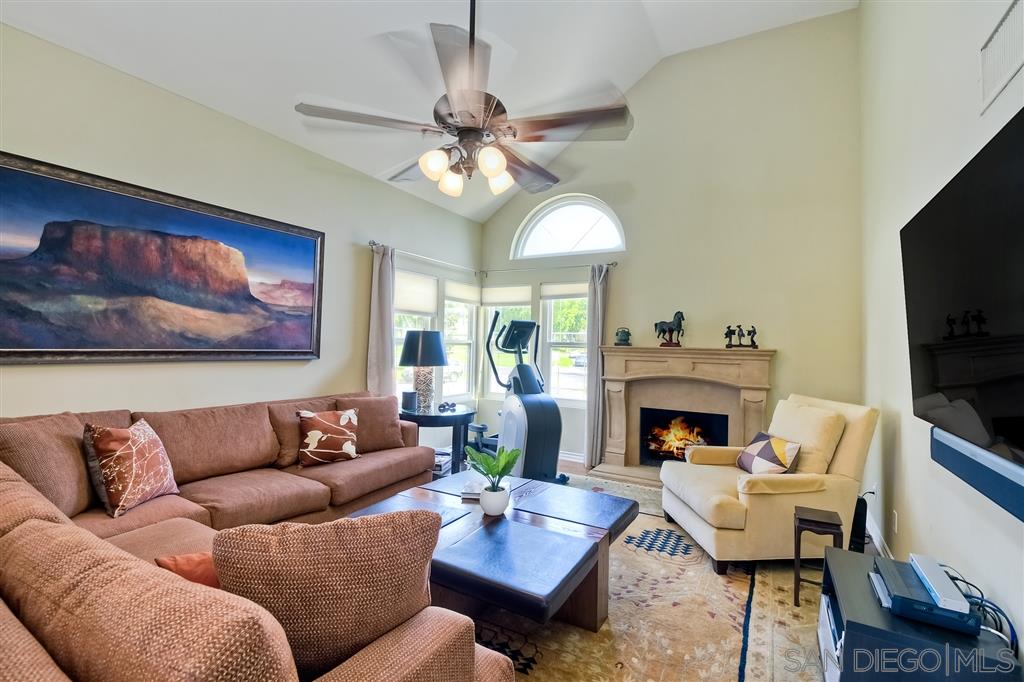 3622 Garner Place Encinitas, CA 92024 - Photo 7 of 25 a living room with furniture fireplace and a flat screen tv