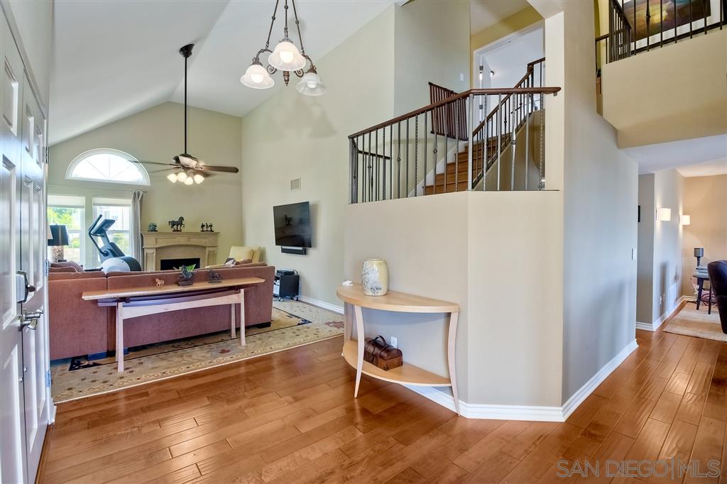 3622 Garner Place Encinitas, CA 92024 - Photo 8 of 25 a living room with furniture a dining table and a chandelier
