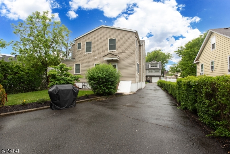 14 Locust Street Madison, NJ 07940 - Photo 3 of 33 a view of a house with a garden