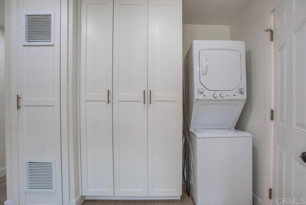 8301 Mission Gorge Road Santee, CA 92071 - Photo 13 of 35 a close view of a utility room with dryer and washer