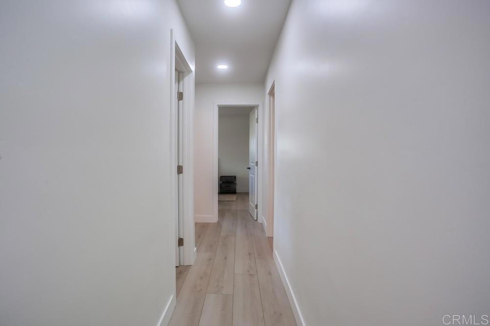 8301 Mission Gorge Road Santee, CA 92071 - Photo 15 of 35 a view of a room with wooden floor