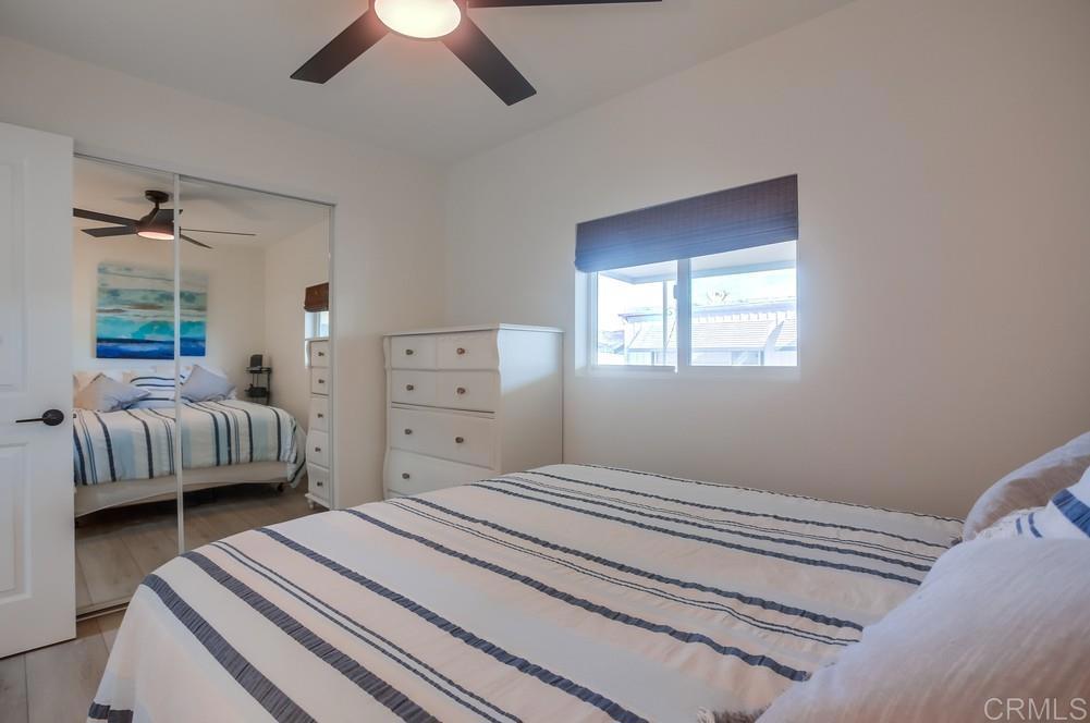 8301 Mission Gorge Road Santee, CA 92071 - Photo 22 of 35 a bedroom with a bed and a window