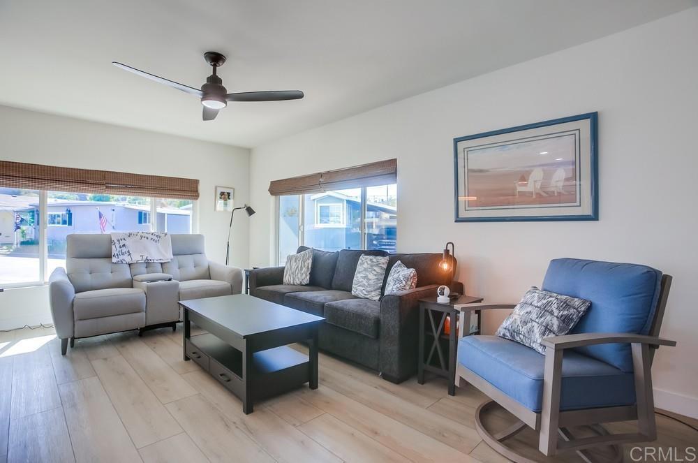 8301 Mission Gorge Road Santee, CA 92071 - Photo 3 of 35 a living room with furniture and a large window