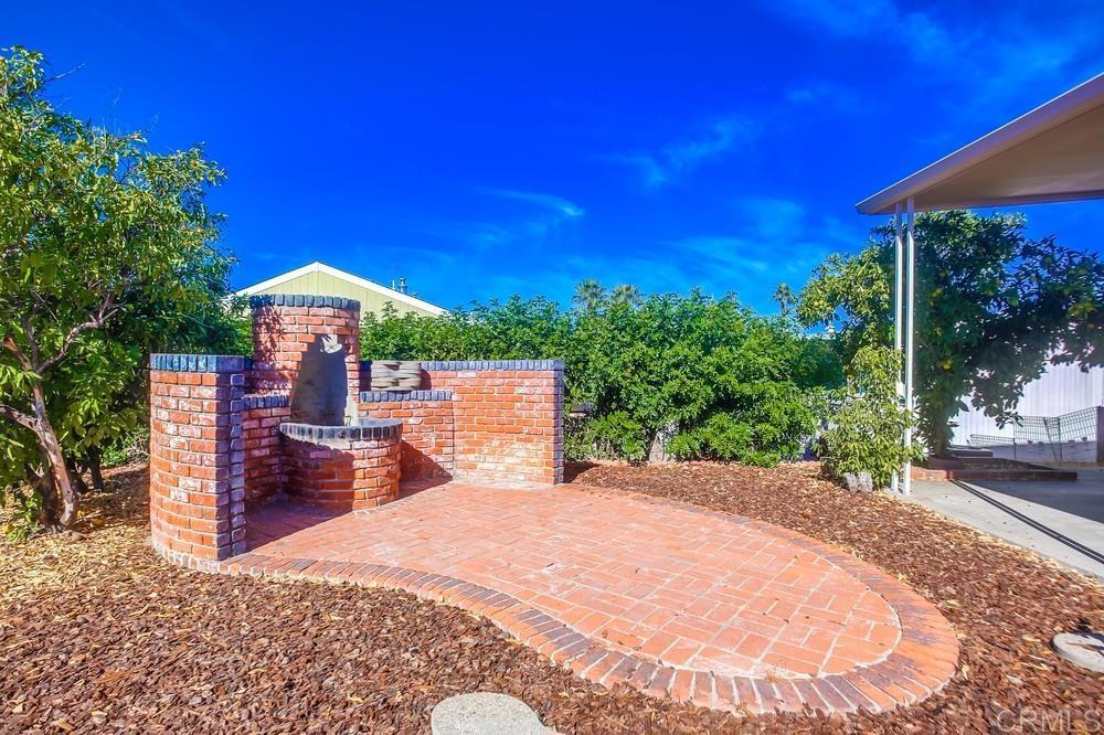8301 Mission Gorge Road Santee, CA 92071 - Photo 32 of 35 a view of a backyard with a patio
