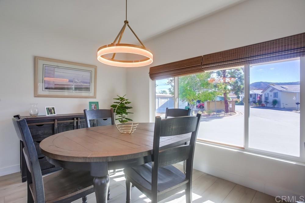 8301 Mission Gorge Road Santee, CA 92071 - Photo 6 of 35 a view of a dining room with furniture window and outside view