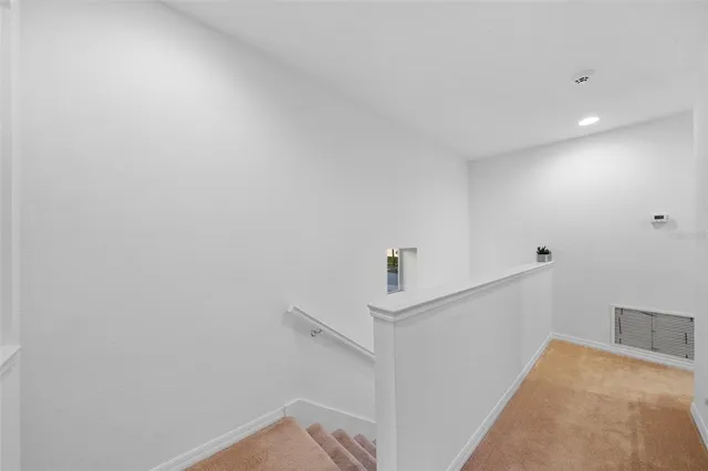 a view of hallway with stairs