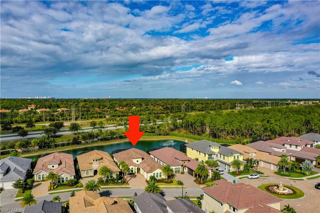 14693 Reserve Lane Naples, FL 34109 - Photo 32 of 34 an aerial view of a house with lots of residential buildings ocean and mountain view in back