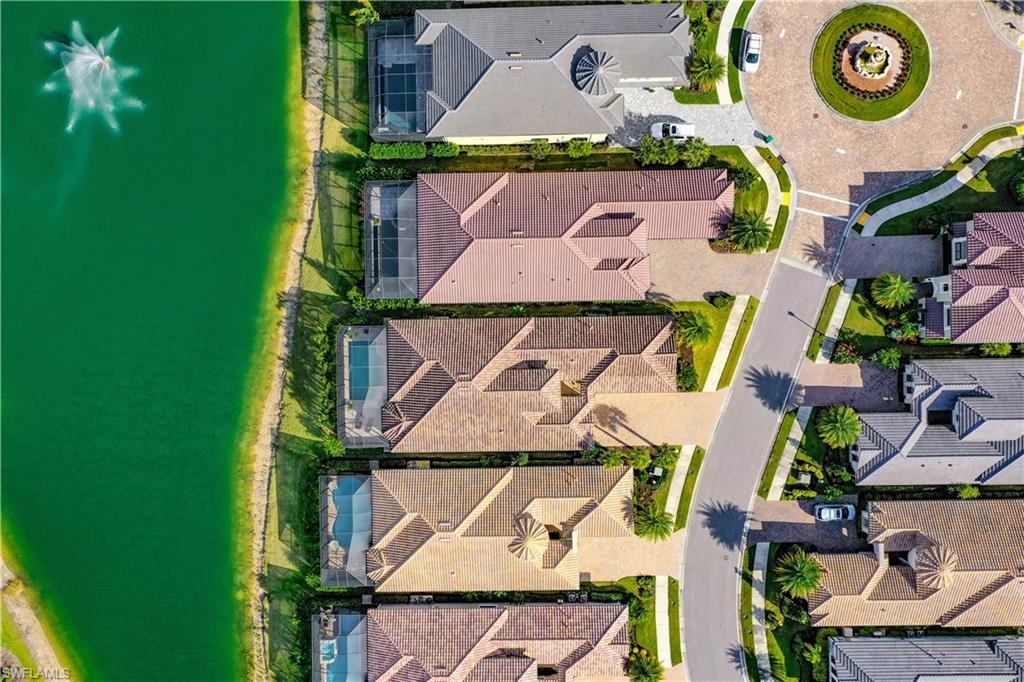 14693 Reserve Lane Naples, FL 34109 - Photo 33 of 34 an aerial view of residential house with outdoor space and swimming pool