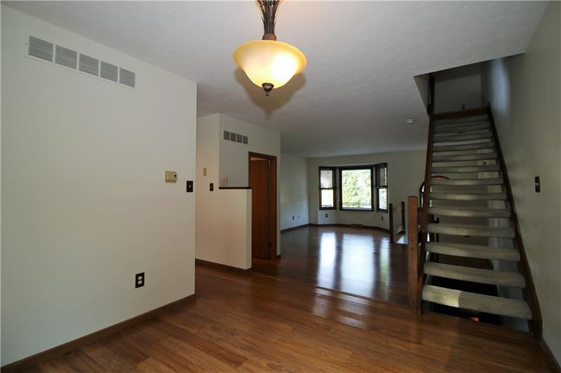 325 Spring Run Drive Monroeville, PA 15146 - Photo 6 of 20 Dining room that steps down into living room. Powder room also on main floor