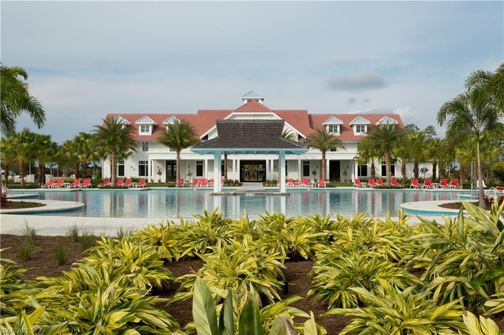9004 Calypso Court Naples, FL 34113 - Photo 44 of 44 a front view of a house with swimming pool