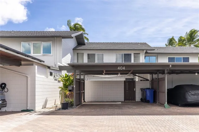 a front view of a house with a garage