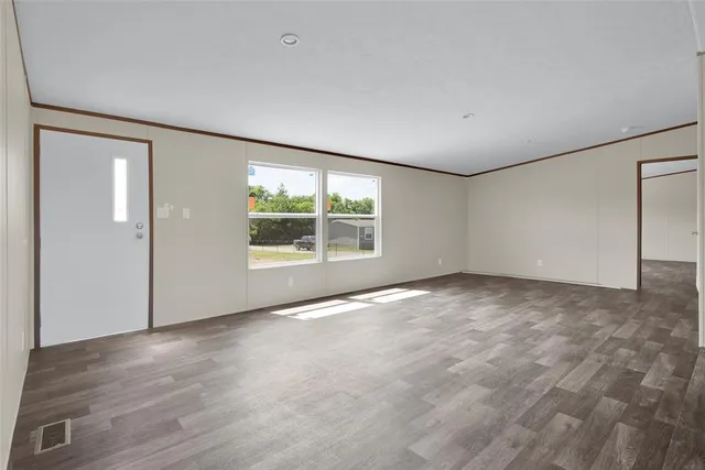 an empty room with windows