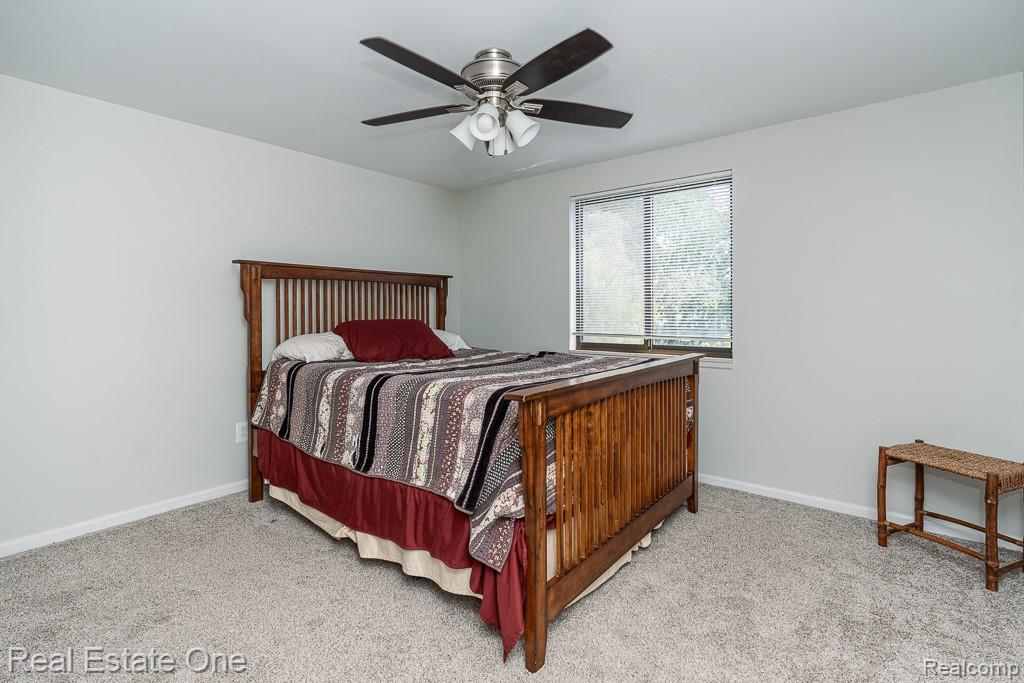 2355 Hillendale Drive Rochester, MI 48309 - Photo 19 of 44 Bedroom featuring light-toned carpeting and a window with blinds