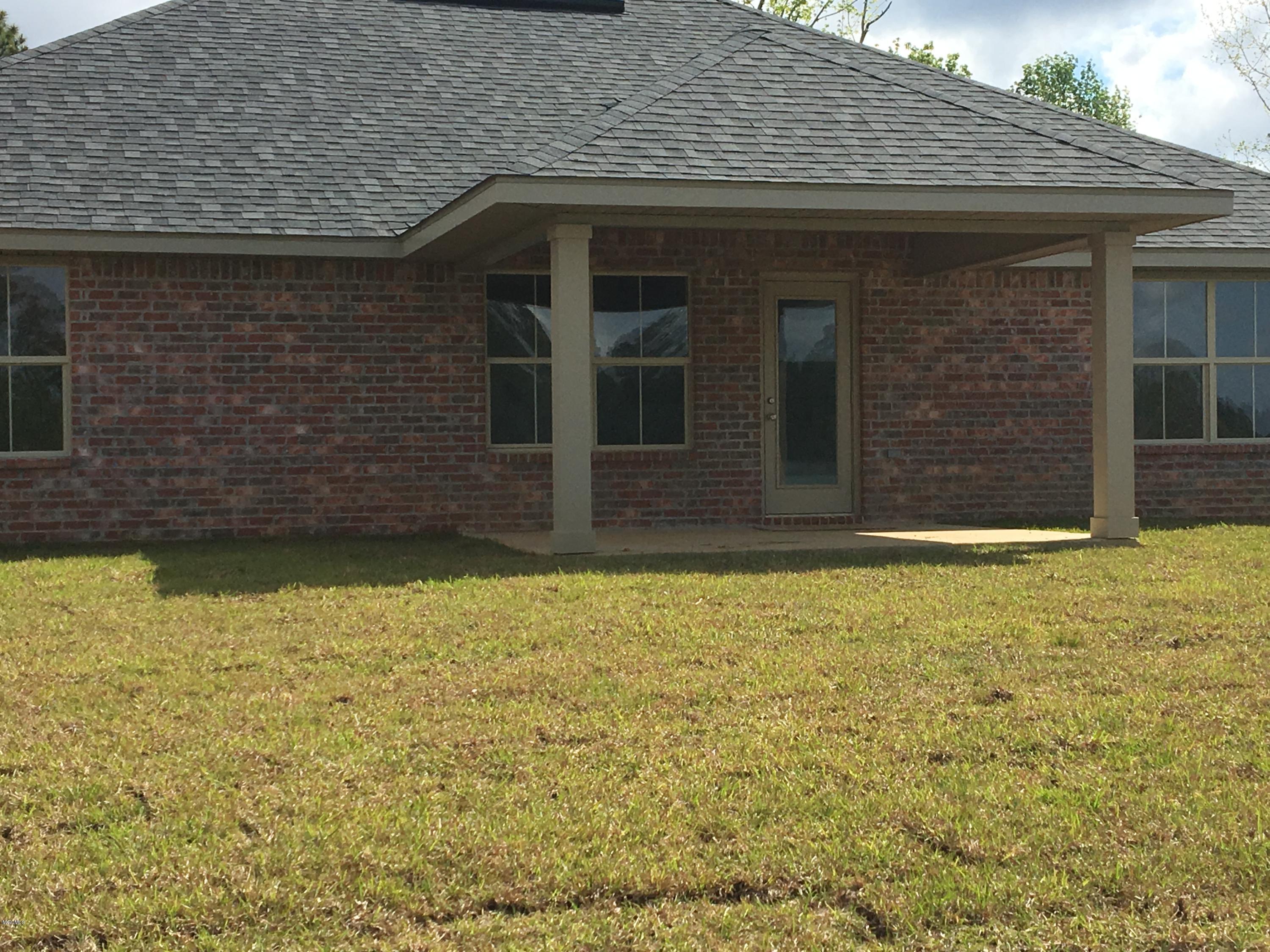 14003 Hudson Krohn Road Biloxi, MS 39532 - Photo 40 of 44 Covered Back Porch