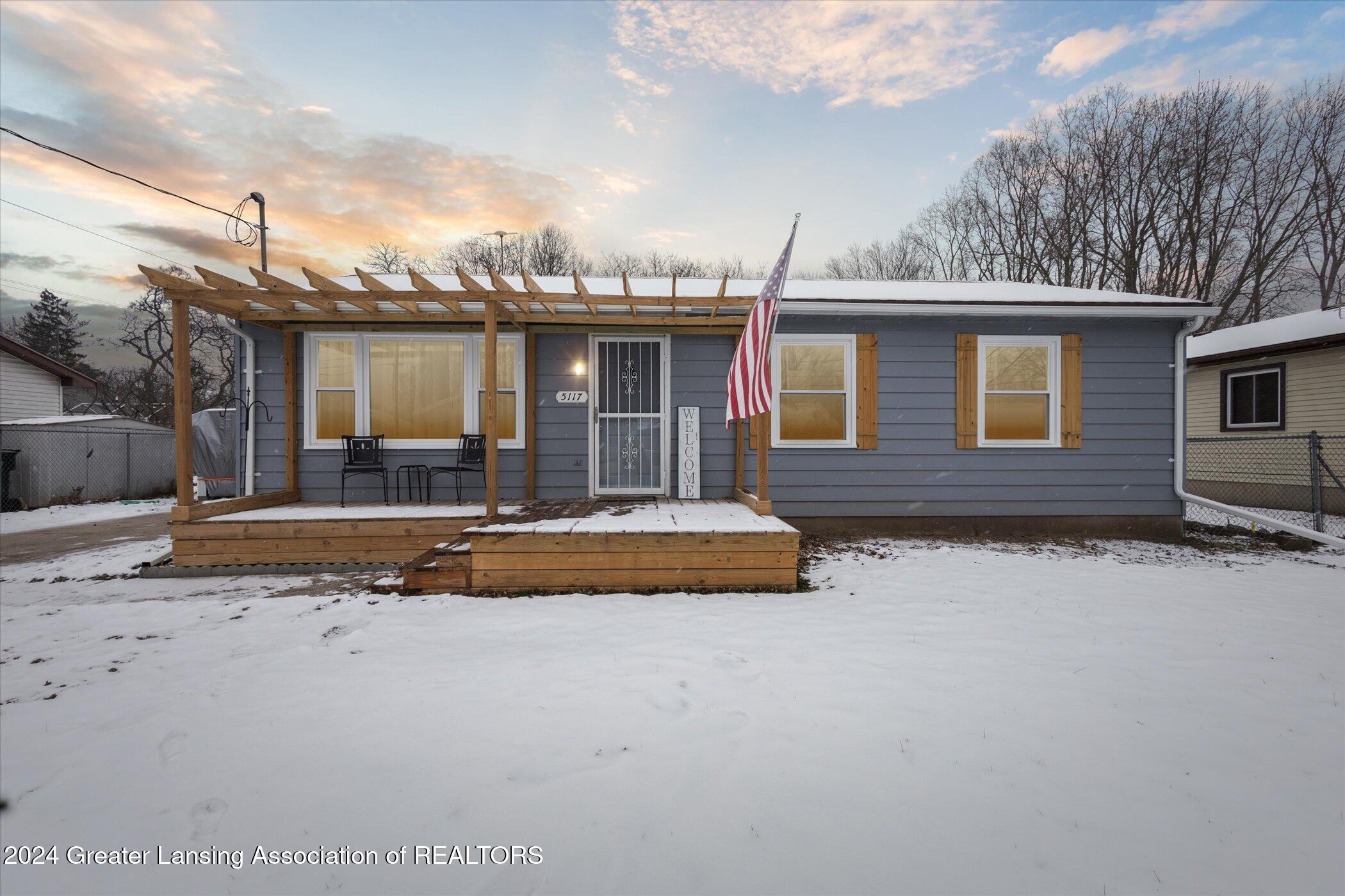 5117 Hughes Road Lansing, MI 48911 - Photo 1 of 38 5117 Hughes Front