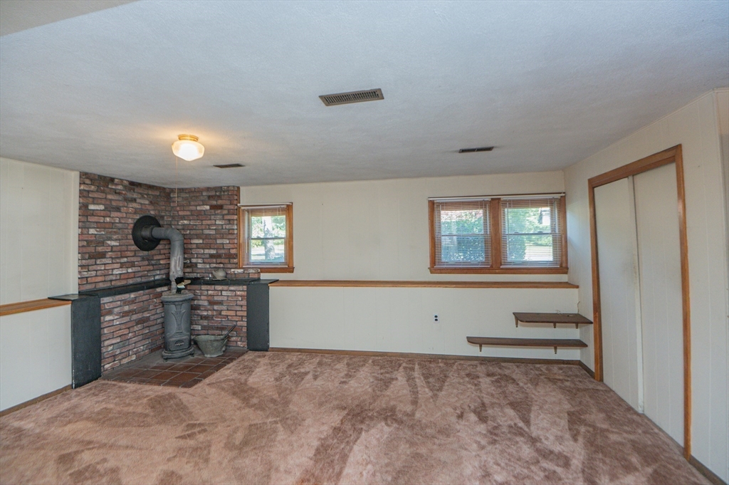 16 Freddy Road Billerica, MA 01821 - Photo 17 of 27 a view of a kitchen with refrigerator and windows