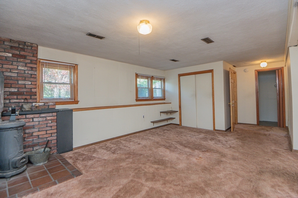 16 Freddy Road Billerica, MA 01821 - Photo 18 of 27 an empty room with windows