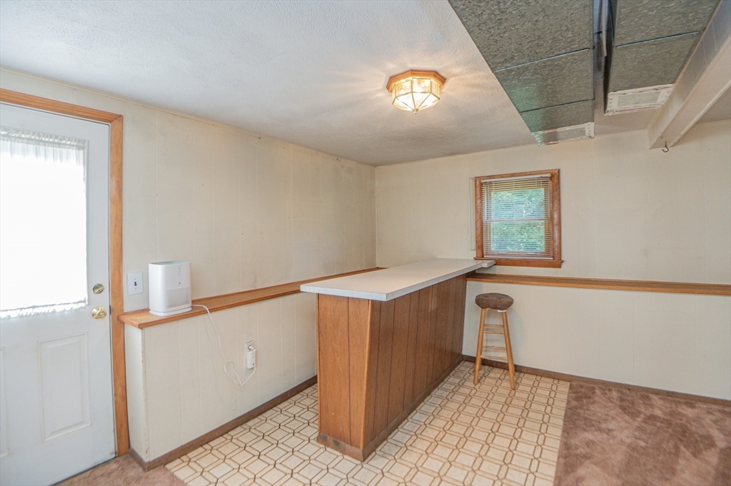 16 Freddy Road Billerica, MA 01821 - Photo 20 of 27 a view of an empty room with windows